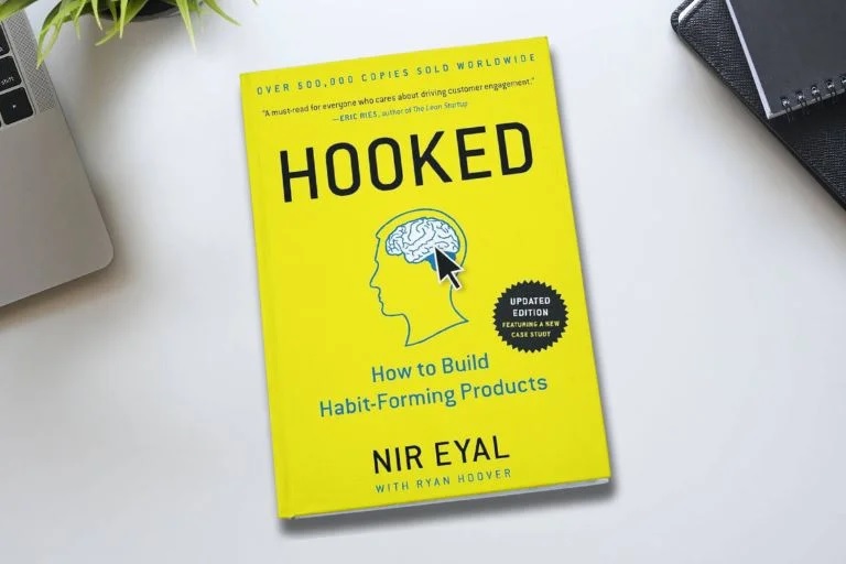 Hooked book by Nir Eyal on tabletop